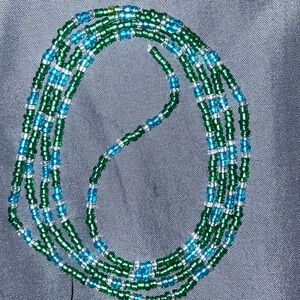 This product is a waist bead . Glass seed bead as the material .